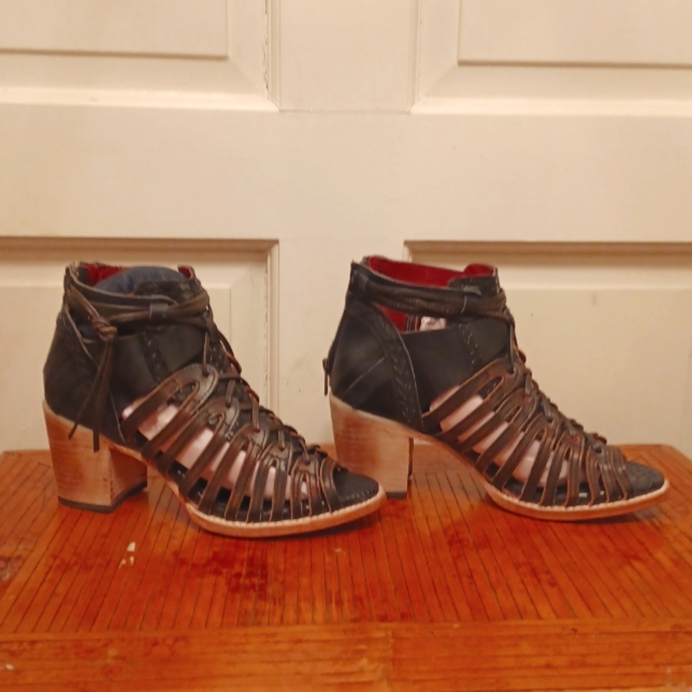 Brand new. Never worn Freebird  Wazze size 9. Black distressed